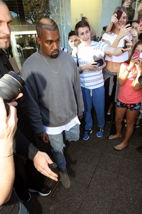 Kanye West fait du shooping à Sydney, le 14 septembre 2014.