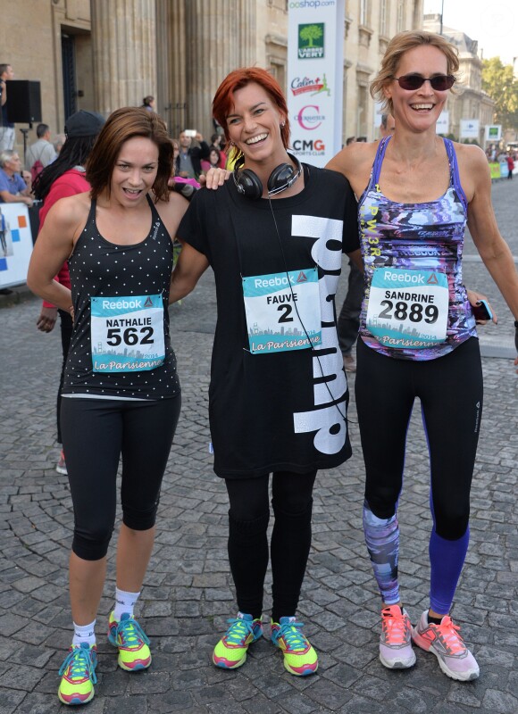 Nathalie Péchalat, Fauve Hautot et Sandrine Retailleau - Course "La Parisienne 2014" pour la lutte contre le cancer, au Champs de Mars à Paris, le 14 septembre 2014.