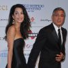 George Clooney et sa fiancée Amal Alamuddin assistent à la soirée "Celebrity Fight Night" à Forte dei Marmi le 7 septembre 2014.