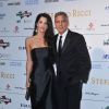 George Clooney et sa fiancée Amal Alamuddin assistent à la soirée "Celebrity Fight Night" à Forte dei Marmi le 7 septembre 2014.