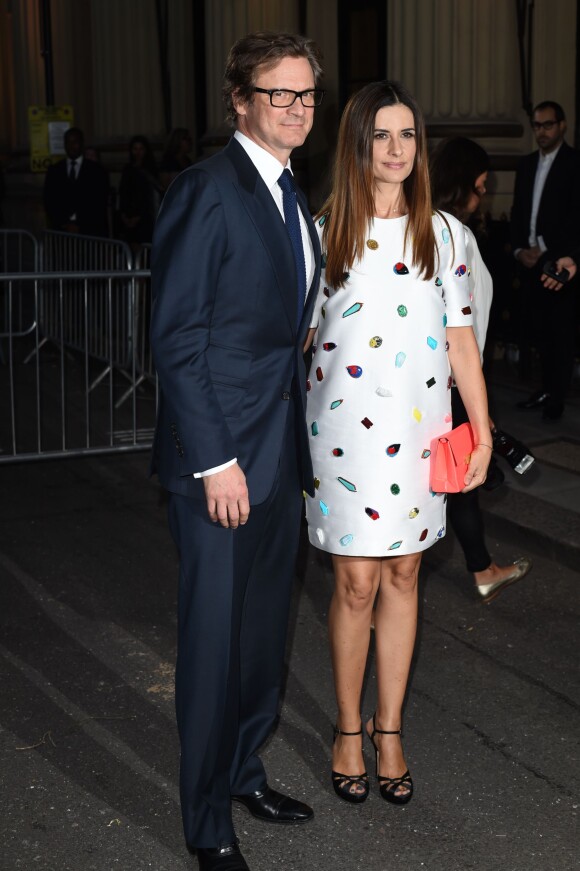 Colin Firth et sa femme Livia assistent à la présentation de la collection écolo de Stella McCartney pour le Green Carpet Challenge. Londres, le 14 septembre 2014.