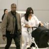 Kanye West, Kim Kardashian et leur fille North, de retour à Los Angeles après leur séjour en Australie. Le 16 septembre 2014.