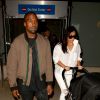 Kanye West, Kim Kardashian et leur fille North arrivent à l'aéroport de Los Angeles, en provenance de Brisbane. Le 16 septembre 2014.