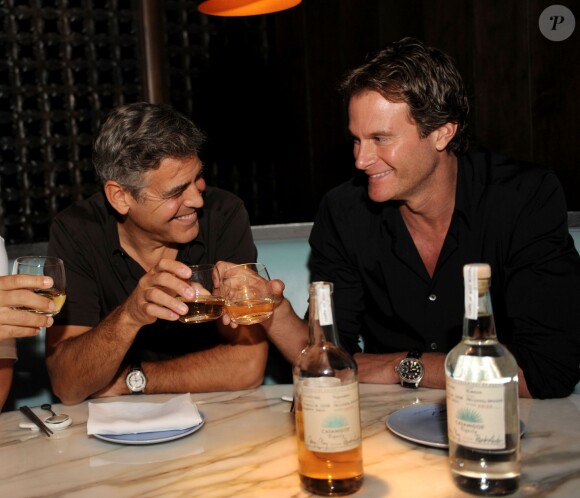 George Clooney, Rande Gerber à Miami,le 8 janvier 2013.