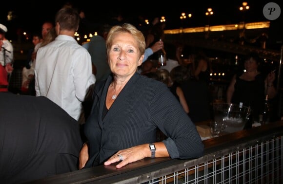 Exclusif - Anne-Sylvie Schneider (Direction de l'Information et de la Communication (DICOM) - mairie de Paris) - Soirée "La Guinguette de Régine" au Bistrot Alexandre III sous le pont Alexandre III à Paris le 19 septembre 2014