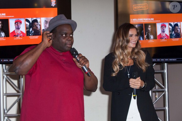 Issa Doumbia et Clara Morgane lors de la conférence de presse des Trace Urban Music Awards 2014 au Casino de Paris. Paris, le 23 septembre 2014.