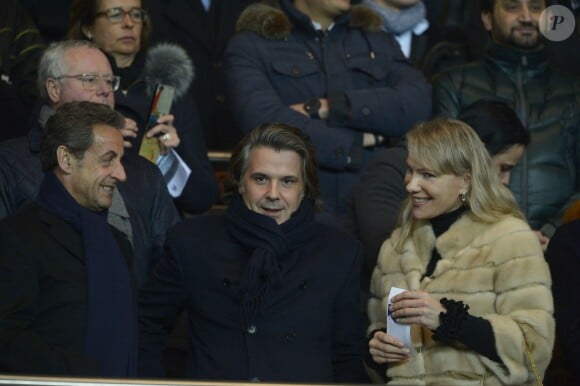 Nicolas Sarkozy, Vincent Labrune et Margarita Louis-Dreyfus à Paris, le 2 mars 201.4 