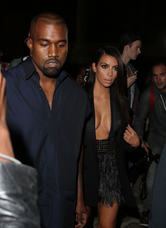 Kanye West et sa femme Kim Kardashian - People arrivant au défilé Lanvin collection Prêt-à-porter Printemps-Eté 2015 lors de la Fashion Week à l'Ecole nationale des beaux-arts à Paris le 25 septembre 2014.