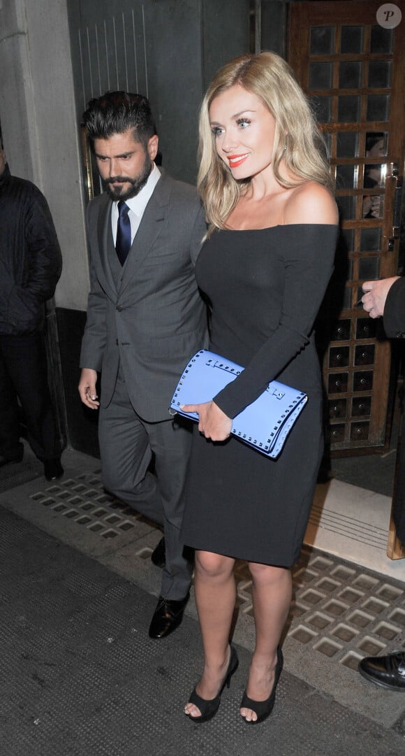 Katherine Jenkins et Andrew Levitas quittent le restaurant Ivy, à Londres, le 14 mars 2014