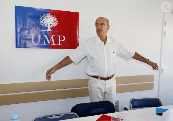 Alain Juppé et sa femme Isabelle lors d'un déjeuner-débat à Castillon-de-Castets le 27 septembre 2014.