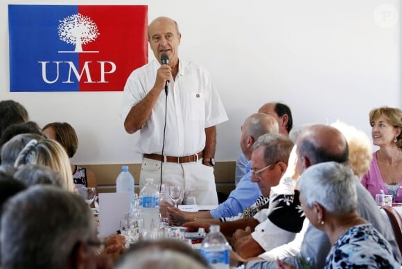 Alain Juppé et sa femme Isabelle lors d'un déjeuner-débat à Castillon-de-Castets le 27 septembre 2014.