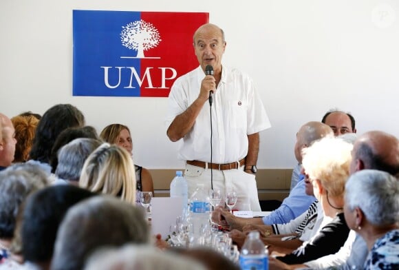Alain Juppé et sa femme Isabelle lors d'un déjeuner-débat à Castillon-de-Castets le 27 septembre 2014.