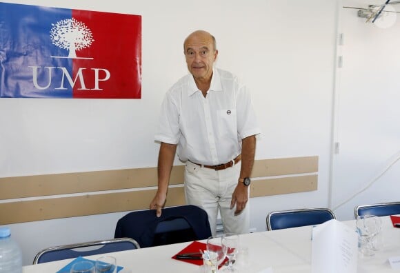 Alain Juppé et sa femme Isabelle lors d'un déjeuner-débat à Castillon-de-Castets le 27 septembre 2014.