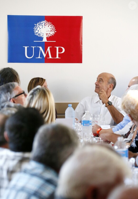 Alain Juppé et sa femme Isabelle lors d'un déjeuner-débat à Castillon-de-Castets le 27 septembre 2014.