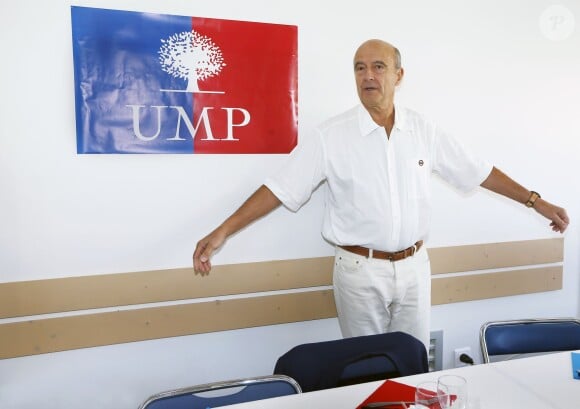 Alain Juppé et sa femme Isabelle lors d'un déjeuner-débat à Castillon-de-Castets le 27 septembre 2014.