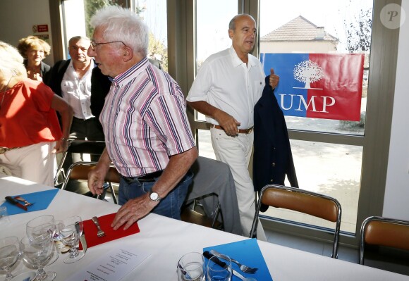 Alain Juppé et sa femme Isabelle lors d'un déjeuner-débat à Castillon-de-Castets le 27 septembre 2014.
