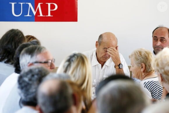 Alain Juppé et sa femme Isabelle lors d'un déjeuner-débat à Castillon-de-Castets le 27 septembre 2014.