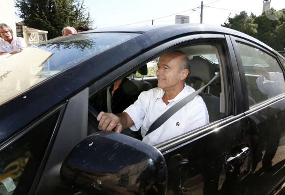 Alain Juppé et sa femme Isabelle lors d'un déjeuner-débat à Castillon-de-Castets le 27 septembre 2014.