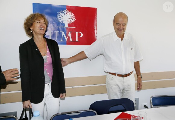 Alain Juppé et sa femme Isabelle lors d'un déjeuner-débat à Castillon-de-Castets le 27 septembre 2014.