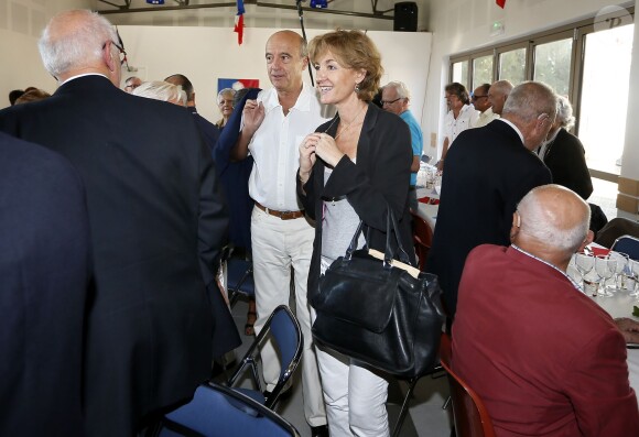 Alain Juppé et sa femme Isabelle lors d'un déjeuner-débat à Castillon-de-Castets le 27 septembre 2014.
