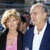 Alain Juppé se promène avec sa femme Isabelle dans les rues de Bordeaux, le 27 septembre 2014.