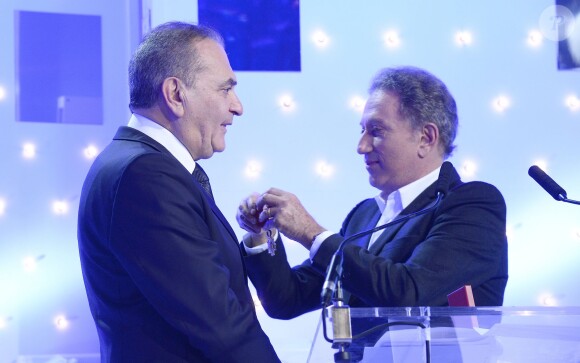 Jean Nainchrik et Michel Drucker - L'animateur a remis la Légion d'honneur à Jean Nainchrik au Pavillon Gabriel à Paris, le 28 septembre 2014.