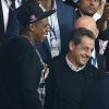 Beyoncé et Jay Z se marrent avec Nicolas Sarkozy - Match PSG-Barcelone de la Ligue des Champions au parc des princes à Paris le 30 septembre 2014. Le PSG à remporté le match sur le score de 3-2.