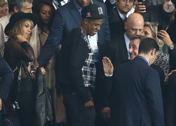 Beyonce et Jay-Z, Nicolas Sarkozy - People assistent au match PSG-Barcelone de la Ligue des Champions 2014 au parc des princes à Paris le 30 septembre 2014. Le PSG à remporté le match sur le score de 3-2. Celebs attend the soccer game between PSG and Barcelona in Paris on 30/09/2014 - Champion's League 201430/09/2014 - Paris