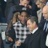 Beyoncé, Jay-Z, Nicolas Sarkozy - Match PSG-Barcelone de la Ligue des Champions au parc des princes à Paris le 30 septembre 2014. Le PSG à remporté le match sur le score de 3-2.