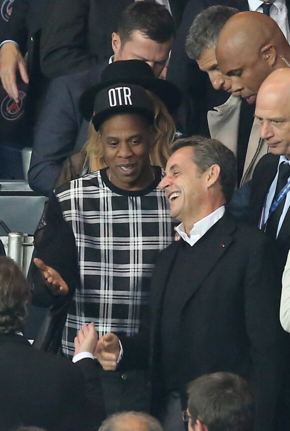 Jay Z et Nicolas Sarkozy - Match PSG-Barcelone de la Ligue des Champions au parc des princes à Paris le 30 septembre 2014. Le PSG à remporté le match sur le score de 3-2.