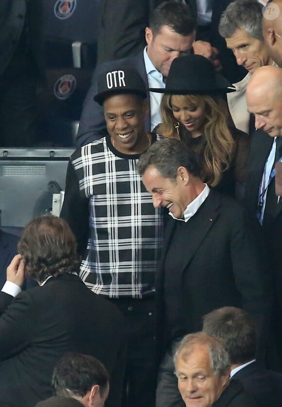 Beyoncé, Jay Z et Nicolas Sarkozy - Match PSG-Barcelone de la Ligue des Champions au parc des princes à Paris le 30 septembre 2014. Le PSG à remporté le match sur le score de 3-2.