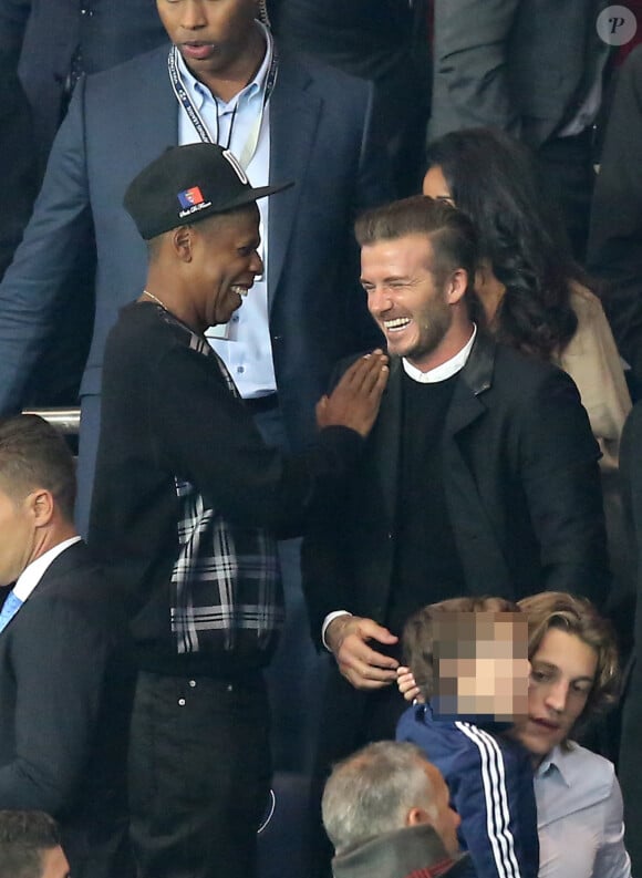 Jean Sarkozy et son fils Solal, Jay Z et David Beckham - Match PSG-Barcelone de la Ligue des Champions au parc des princes à Paris le 30 septembre 2014. Le PSG à remporté le match sur le score de 3-2.