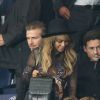 Jean Sarkozy et son fils Solal, Beyoncé et David Beckham - Match PSG-Barcelone de la Ligue des Champions au parc des princes à Paris le 30 septembre 2014. Le PSG à remporté le match sur le score de 3-2.