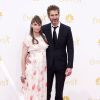 Amanda Peet enceinte de son 3e enfant et son mari David Benioff à la 66e cérémonie annuelle des Emmy Awards au Nokia Theatre à Los Angeles, le 25 août 2014.