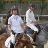 L'infante Elena d'Espagne, sur Quant, et son ami intime et ex-compagnon Luis Astolfi lors du jumping II Ruta Via de la Plata au Club Royal La Pinède à Séville le 4 octobre 2014.