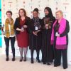 Les gagnantes de la cérémonie Women of the Year (Fahma Mohamed, avec le voile, récompensée par Lindsay Lohan) le 13 octobre 2014 à Londres.
