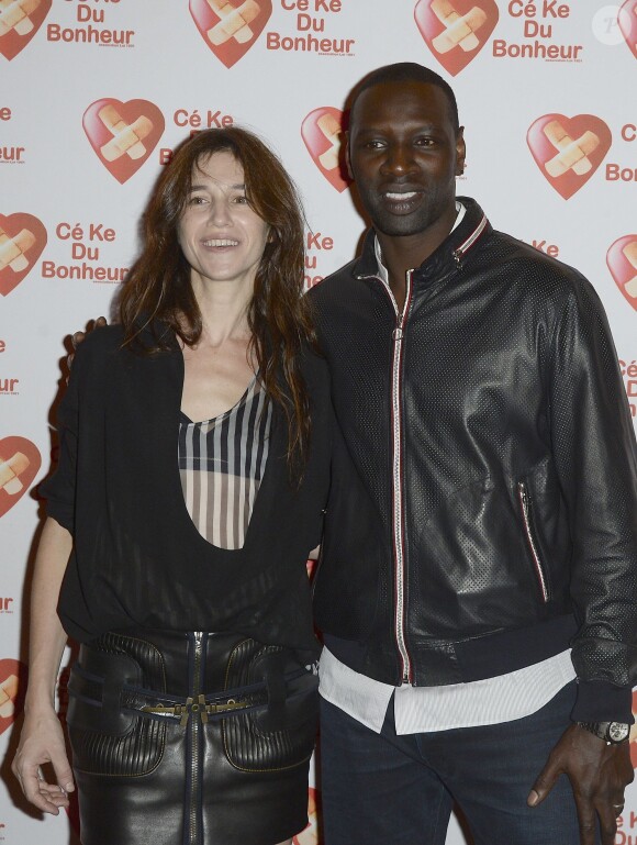 Charlotte Gainsbourg et Omar Sy - Avant-Première du film "Samba" au Gaumont Champs-Elysées Marignan à Paris pour l'association "Cé Ke du Bonheur" à Paris le 14 octobre 2014.