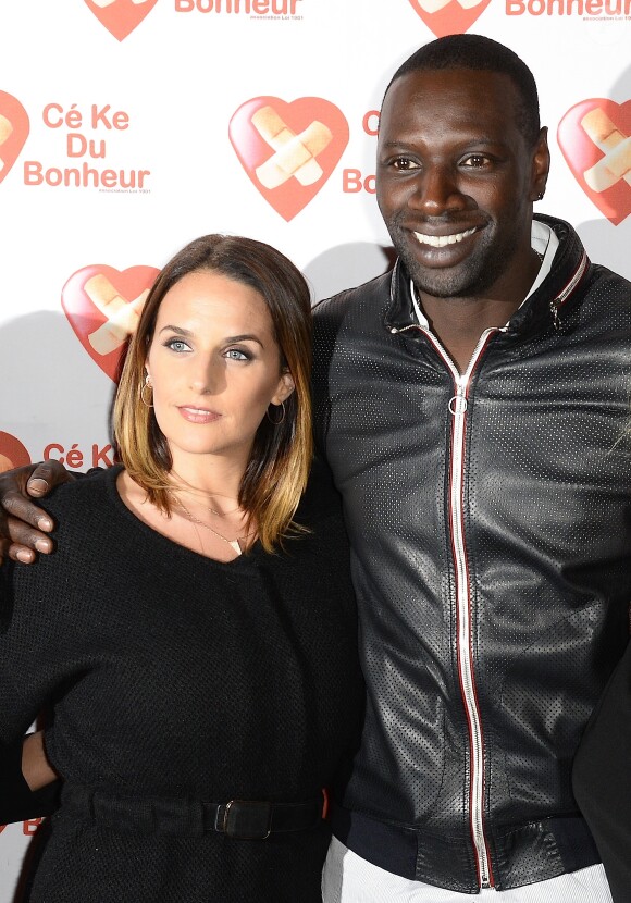 Omar Sy et sa femme Hélène - Avant-Première du film "Samba" au Gaumont Champs-Elysées Marignan à Paris pour l'association "Cé Ke du Bonheur" à Paris le 14 octobre 2014.