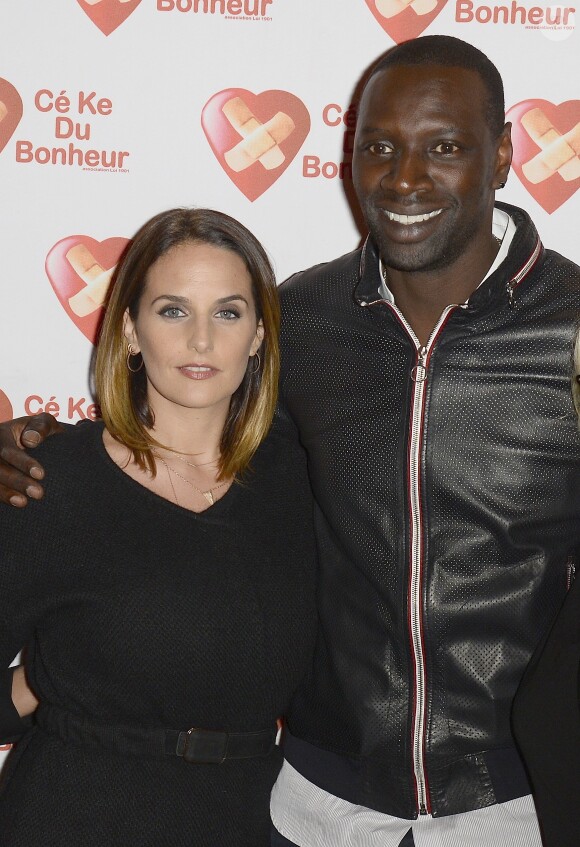 Omar Sy et sa femme Hélène - Avant-Première du film "Samba" au Gaumont Champs-Elysées Marignan à Paris pour l'association "Cé Ke du Bonheur" à Paris le 14 octobre 2014.