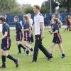 Le prince Harry a participé à une session d'entraînements avec le club d'Eccles RFC à Salford, dans la banlieue de Manchester, avant de participer à un festival de l'ovalie avec des jeunes enfants, le 20 octobre 2014