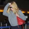 Gwyneth Paltrow quitte l'aéroport de LAX à Los Angeles, le 16 octobre 2014.