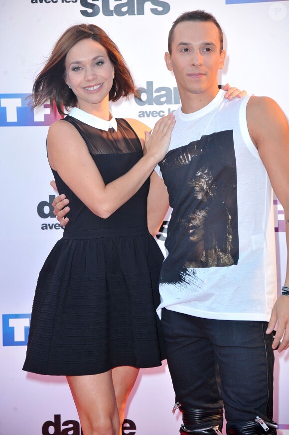 Nathalie Péchalat et Grégoire Lyonnet lors du photocall de présentation de la nouvelle saison de "Danse avec les Stars 5" à Paris, le 10 septembre 2014.
