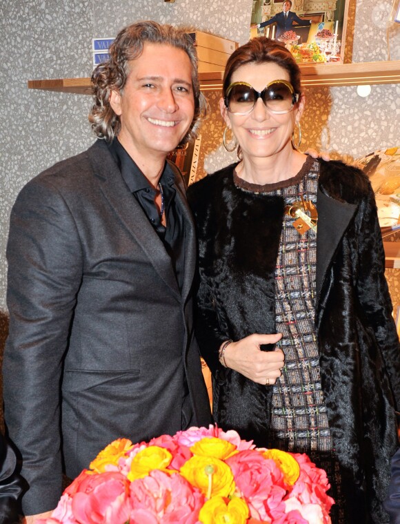 Carlos Souza et Martine Assouline lors du lancement du livre de Valentino Garavani à New York, le 6 novembre 2014.