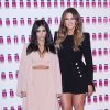 Khloé et Kim Kardashian assistent à la soirée de lancement de la marque Hairfinity au Royaume-Uni. Londres, le 8 novembre 2014.