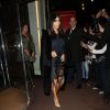 Kim et Khloé Kardashian quittent l'hôtel 45 Park Lane à Londres, le 8 novembre 2014.