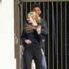 Exclusif - Iggy Azalea et son petit ami Nick Young, complices et taquins à Los Angeles. Le 2 novembre 2014.