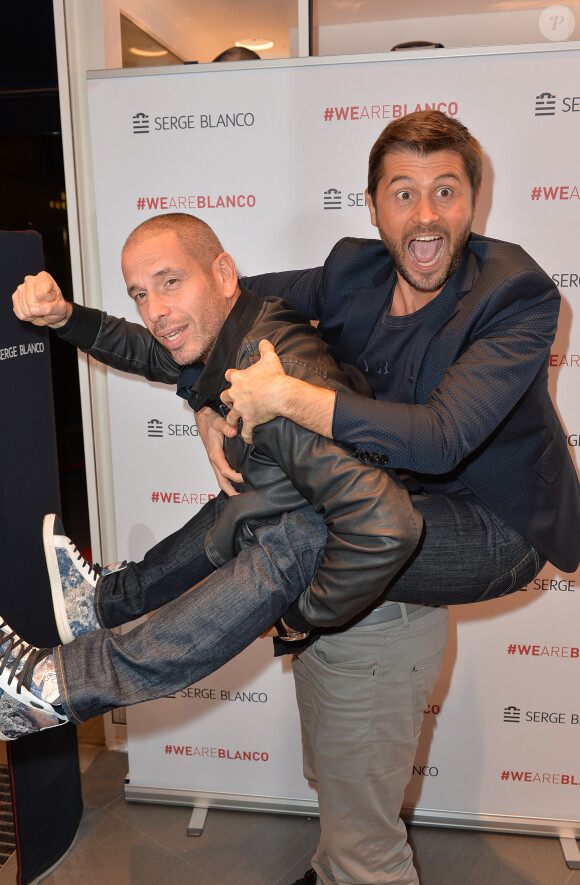 Medi Sadoun et Christophe Beaugrand lors de l'inauguration de la boutique Serge Blanco avenue de l'Opéra à Paris, le 13 novembre 2014