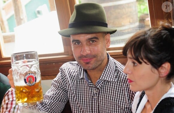 Le coach Pep Guardiola et sa femme Cristina Guardiola à Munich, le 6 octobre 2013. 