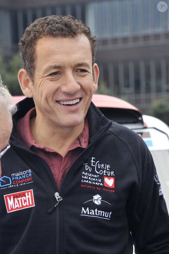Exclusif - Dany Boon, parrain de l'Ecurie du Coeur (équipe MD Rallye Sport) qui prendra le départ du rallye Dakar 2015 au profit de l'association Mécénat Chirurgie Cardiaque, lors de la présentation de la voiture avec l'équipe à Saint-Denis, le 19 novembre 2014.