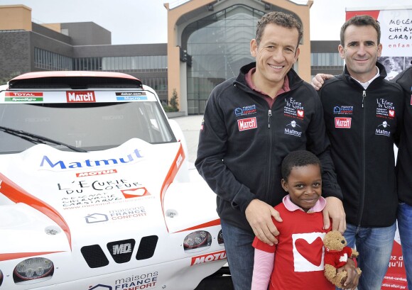 Exclusif - Dany Boon, parrain de l'Ecurie du Coeur (équipe MD Rallye Sport) qui prendra le départ du rallye Dakar 2015 au profit de l'association Mécénat Chirurgie Cardiaque, lors de la présentation de la voiture avec l'équipe à Saint-Denis, le 19 novembre 2014.